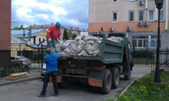 Вывоз строительного мусора самосвалом с грузчиками 