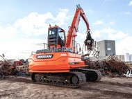 Гусеничный перегружатель Develon DX300MH Doosan