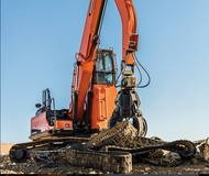 Гусеничный перегружатель Develon DX420MH Doosan